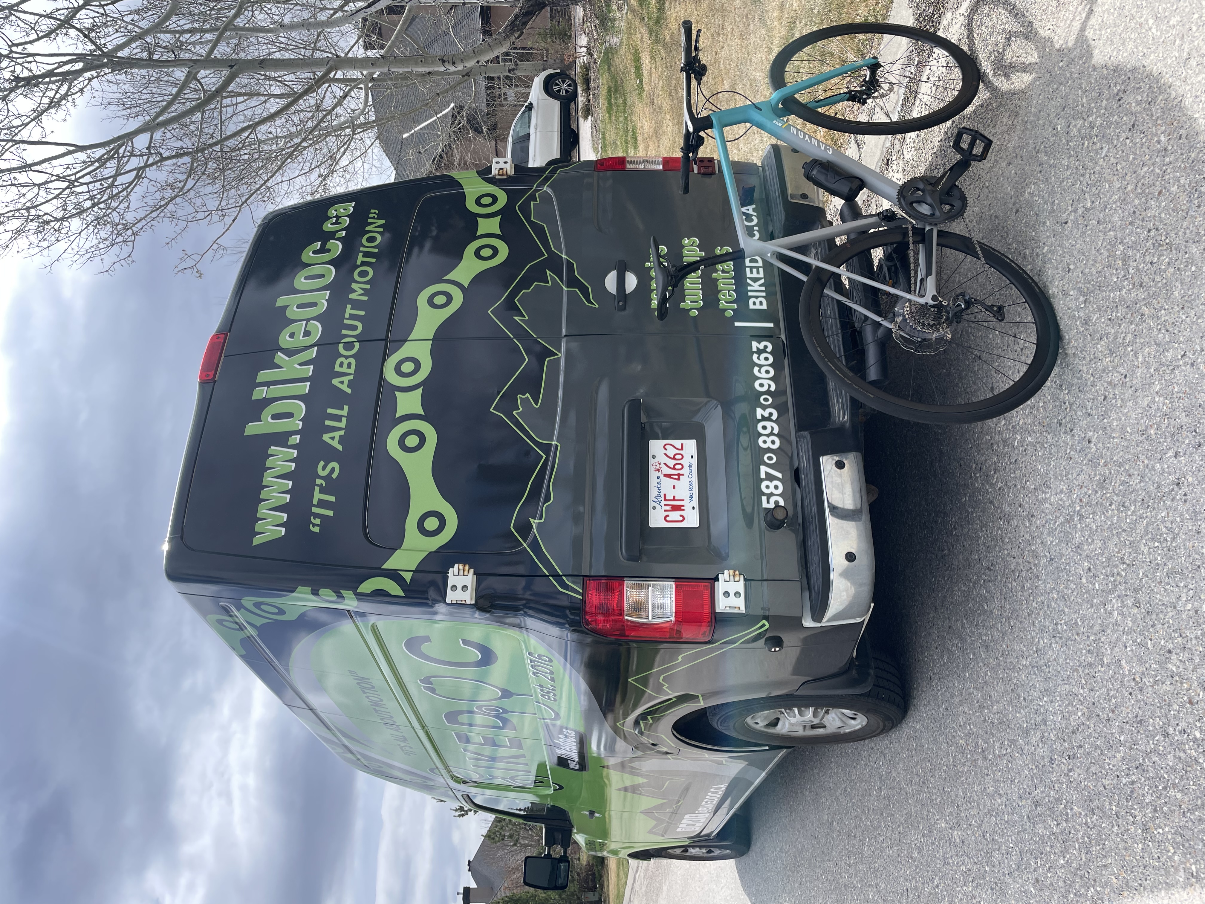 Bike Doc van out on a service call with customer bike